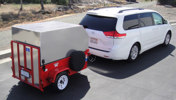 Specialty mobility trailer behind a minivan